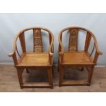 Pair of Chinese elm horseshoe chairs,