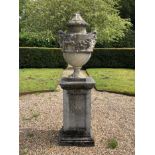 Classical urn on square base, 185cm high, the base 49cm square