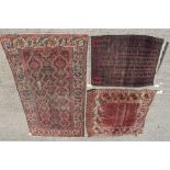 Three Eastern rugs