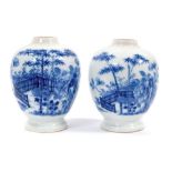 Pair of 18th century Chinese soft-paste porcelain tea canisters