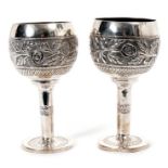 Pair contemporary silver goblets of conventional form, with bands of floral decoration