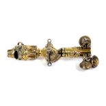 Georgian silver gilt baby's rattle, with scroll and floral decoration,