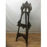 Late 19th / early 20th century Moorish carved gallery easel, in the manner of Libertys