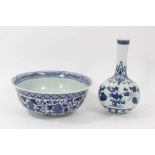 Chinese blue and white vase and bowl, 20th century, both decorated with floral patterns and with sea