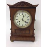 19th century mantle clock with French movement striking on bell in Regency flame mahogany case on gi