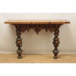 19th century baroque style carved walnut console table, with rectangular top on mask carved frieze a