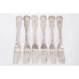 Six mid 19th century German Silver Dinner Forks, Modified Kings pattern with fluted stems and foliat