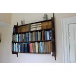 19th century mahogany hanging waterfall fronted bookcase with three shelves and pierced sides with r