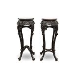 Pair of late 19th / early 20th century marble topped carved hardwood urn stands, each of octagonal f