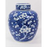 Chinese blue and white porcelain ginger jar and cover, c.1900, decorated with prunus blossom, double