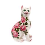 Wemyss pottery cat, painted with pink cabbage roses, with inset green glass eyes, inscribed marks to