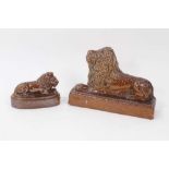 19th century salt glazed stoneware pottery door stop in the form of a lion, 18.5cm wide x 12.5cm hig