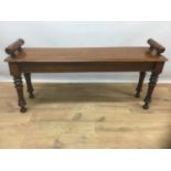 Victorian mahogany window seat with turned ends, on ring turned legs, 96cm long