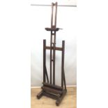 A large late 19th century Rowney artist's easel - indistinctly stamped London Artists Colourmen, Mad