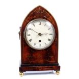 Regency bracket clock in brass inlaid case