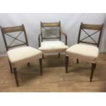 Set of ten Regency mahogany dining chairs with X shaped splat and stuff over seat and ring turned le