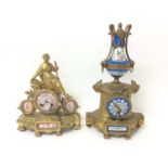 Two late 19th century French gilt metal and porcelain mounted mantel clocks with cherub and bird dec