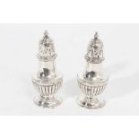 Pair of Victorian silver pepper casters of baluster form