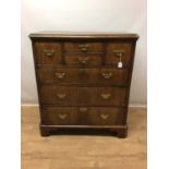 18th century walnut crossbanded chest of drawers, with two short over three long graduated drawers b