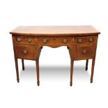 George III mahogany and satinwood crossbanded and marquetry inlaid bowfront sideboard, with central