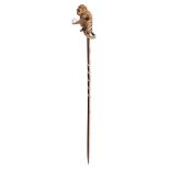 Good quality late Victorian novelty gold stick pin in the form of a monkey holding a pearl ball, fin