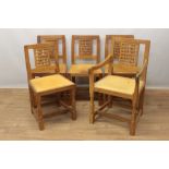 Set of five Robert Mouseman Thompson carved oak dining chairs, each with lattice carved back and clo