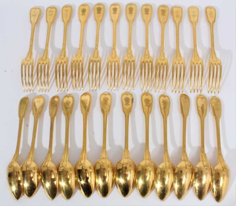 Late 19th French gilded fiddle thread pattern dessert flatware by Christofle, Paris, some engraved w