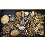 Collection of Victorian gilt metal jewellery to include seven lockets, guard chains, pair of banded