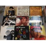 Case of LP records including The Beatles, The Who, Robert Plant, Marc Bolan, Stevie Wonder, Earth, W
