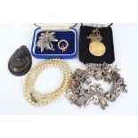 Silver charm bracelet and costume jewellery to include simulated pearl necklace