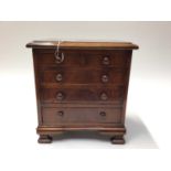 Miniature mahogany chest of drawers