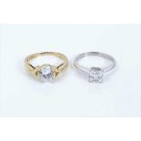 Two 9ct gold synthetic stone solitaire rings