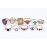 Eleven gold and yellow metal gem set dress rings