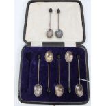 Seven silver bean end coffee spoons, in fitted case