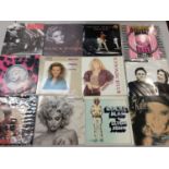 Two boxes of single records including Elton John, Blondie, Kate Bush, Madonna, Joy Zipper, Gary Numa