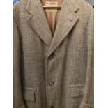 Gentlemen's long length Harris Tweed coat, sleeves with turn back cuffs.