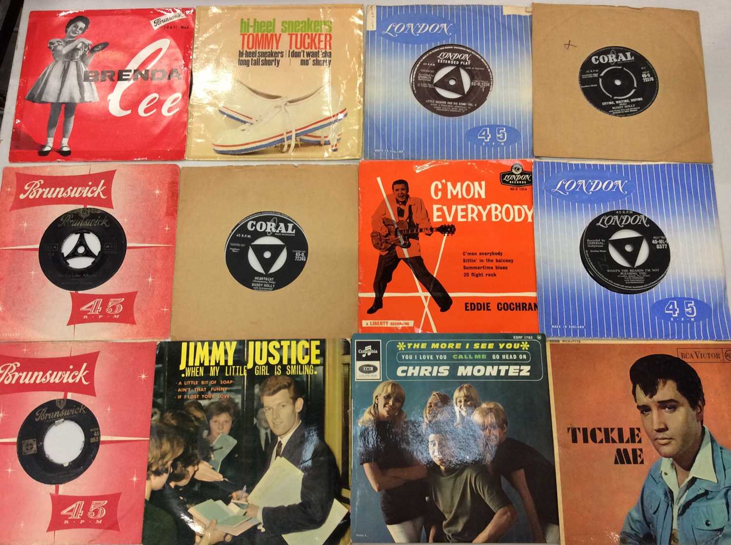 Carrying case of single records and EP's including Tommy Tucker, Fats Domino, Buddy Holly, Casillacs