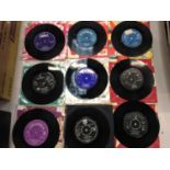 Box of 150 single records including The Outlaws, Oympics, Elvis, Cliff, Tommy Roe, Nite People, and