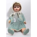 Doll - Armand Marseille 995 A 7 M bisque head and composite limbs and boby.