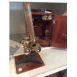 Antique brass microscope in original mahogany case