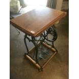 Green painted sewing machine converted to a table