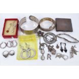 Group silver and white metal jewellery to include two silver bangles, pendants, chains, earrings, ge