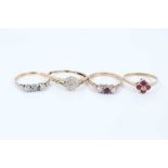 Four gold diamond and ruby rings