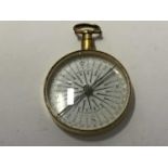Early 19th century pocket compass in gilt case by Abraham of Liverpool