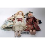 A reproduction Simon & Halbig doll plus selection of reproduction twelve dresses, hats and other clo