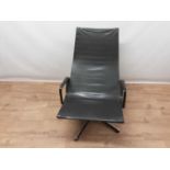 Vintage aluminium and leather swivel lounge chair in the manner of Charles and Ray Eames