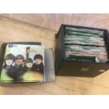 Carrying case of approx 50 Beatles singles- most in ex. condition together with a selection of other