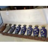 Group of modern Chinese boxed items to include cloisonné vases, cinnabar lacquer vase