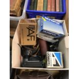 Box of cameras and lenses and accessories