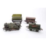 Railway 0 gauge clockwork loco and two wagons plus a boxed Knights head hopper wagon